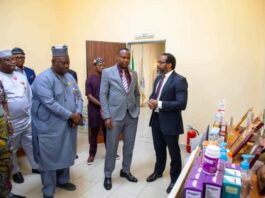 The Honourable Minister of State for Health & Social Welfare Dr. Iziaq Adekunle Salako listening to briefing by the Director-General of NIPRD, Dr. Obi Adigwe during his Familiarization visit. To his right: Dr. Salaudeen Jimoh mni, Director Hospital Services Department in the Ministry.