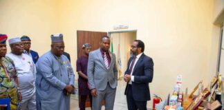 The Honourable Minister of State for Health & Social Welfare Dr. Iziaq Adekunle Salako listening to briefing by the Director-General of NIPRD, Dr. Obi Adigwe during his Familiarization visit. To his right: Dr. Salaudeen Jimoh mni, Director Hospital Services Department in the Ministry.