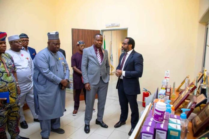 The Honourable Minister of State for Health & Social Welfare Dr. Iziaq Adekunle Salako listening to briefing by the Director-General of NIPRD, Dr. Obi Adigwe during his Familiarization visit. To his right: Dr. Salaudeen Jimoh mni, Director Hospital Services Department in the Ministry.