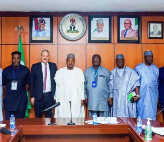 The Hon. Minister of Budget and Economic Planning, Senator Abubakar Atiku Bagudu(c) flanked to the left by the Country Director, GIZ, Makus Wagner and other Stakeholders, during the meeting on the development of National Hydrogen Policy, today, in Abuja.