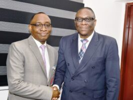 L-R; Director-General, Bureau of Public Procurement, BPP, Dr. Adebowale A. Adedokun, MCIPS, ACFE in a warm handshake with Regional Procurement Coordinator African Development Bank, AfDB, Mr. Kelvin Lumbila, during his visit to the BPP today, 17th February, 2025