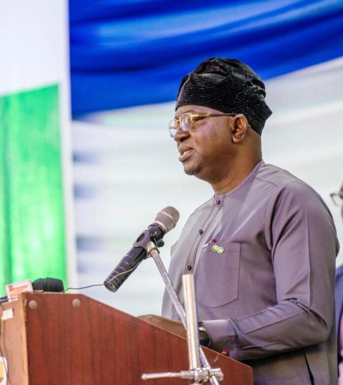 The Honourable Minister of water Resources and Sanitation, Engr. Prof. Joseph Terlumun Utsev, delivering his Keynote address during the opening ceremony of the CNC Retreat