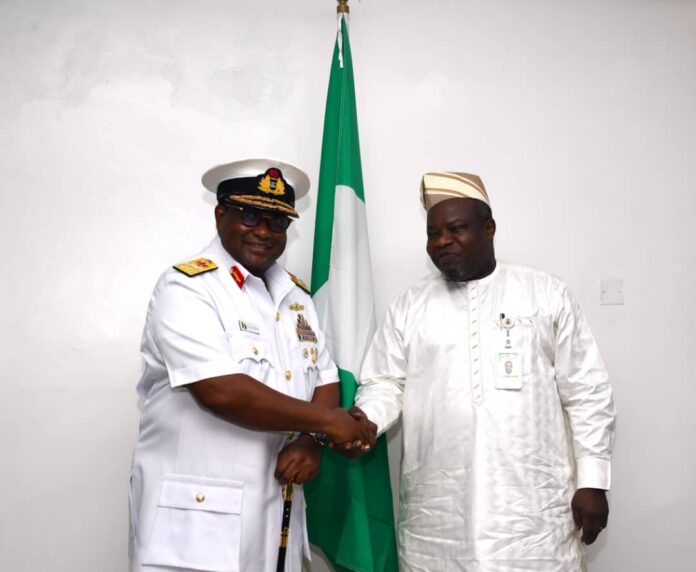 *Pix : Surveyor General of the Federation Surv. Abuduganiyu Adeyemi Adebomehin in a handshake with the Hydrographer of the Federation Rear Admiral Ayo Olugbode during his visit to OSGOF office today 11/02/2025*