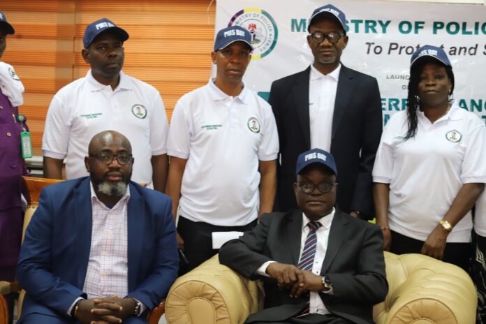 Seated L-R: PMS Resource Person, Professor Adeyemi Ajayi and Permanent Secretary, Ministry of Police Affairs, Dr. Anuma Ogbonnaya Nlia (S) Deputy Director(Appointment Discipline and Promotion), Ibrahim Shetimma; Director Finance and Accounts, Okhie IsaacTochukwu; Director, Human Resources Management, Ohanyere Ikemefuna; and Director, Police Inspectorate, Bola Aderele during the official launch of Performance Management System Day at the Ministry for evaluation, discipline, and Promotion of the staff at the Ministry of Police Affairs Headquarters in Abuja recently.