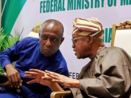 The Honourable Minister, Federal Ministry of Marine & Blue Economy, Adegboyega Oyetola CON, in a chat with the President, Nigerian Guild of Editors, Eze Anaba.