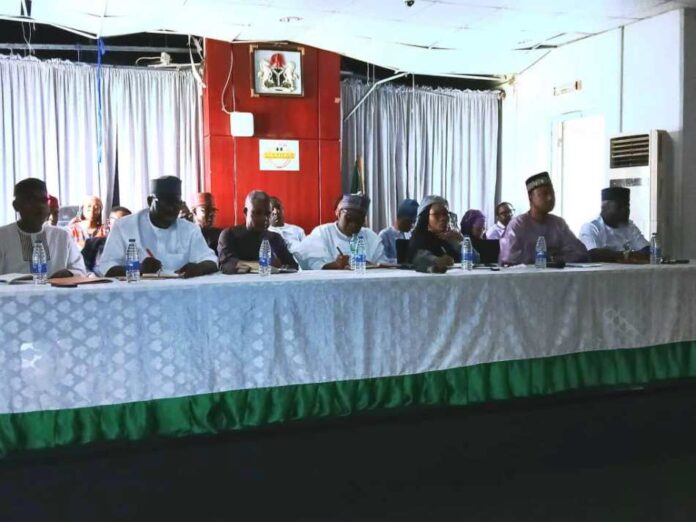 The Honourable Minister of Regional Development Engr. Abubakar Momoh (middle), the Permanent Secertary Mrs. Tinuke Watti (to his left) and other Directors of the ministry during the 2025 1st quarter town hall meeting.