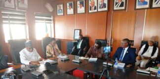 The Honourable Minister of Regional Development Engr. Abubakar Momoh addressing members of the Academic Associates PeaceWorks (AAPW) during a working visit in his office, in Abuja.