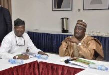 The Director, Agricultural Land and Climate Change Management Services, Mr Olanipekun Oshadiya and Minister of State for Agriculture and Food Security, Sen.Dr Aliyu Sabi Abdullahi, during the Final Validation Workshop held in Abuja