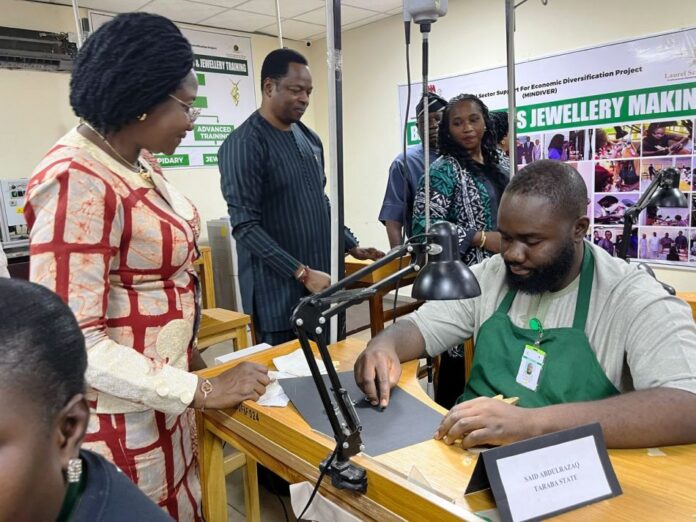 The Permanent Secretary of Solid Minerals, Dr. Mary Ogbe addressing the students of School of Jewellery Training Centre in Abuja