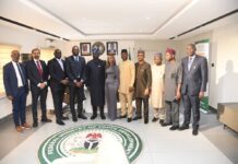 The Honourable Minister, Federal Ministry of Youth Development, Comrade Ayodele Olawande poses for a group photograph with management staff and representatives from Flutterwave and Alami Capital Management Group Limited during the signing of the Memorandum of Understanding (MoU).