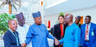 Vice President Kashim Shettima (middle) shakes hands with the Director-General, International Labour Organisation (ILO) (right) and President of the Nigeria Labour Congress, Joe Ajaero (left), while Minister of Labour and Employment, Muhammad Maigari Dingyadi (2nd from left), Minister of State for Labour and Employment, Nkeiruka Onyejeocha (2nd from right), and 1st National Deputy President of the Trade Union Congress, Dr. Tommy Etim-Okon (far right), watch during a courtesy visit to the Vice President by the ILO DG at the Presidential Villa in Abuja on Thursday (13/02/2025).