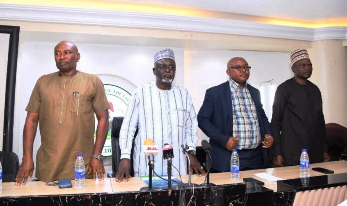 Rep. of the PS, FMIST, D (HRM), Mr. Hassan Baba Ibrahim (2nd left),and other Directors in the Ministry during the Final National Exam of the 9th Edition of 774 Young Nigerian Scientists Presidential Award (774 YONSPA), today in Abuja.