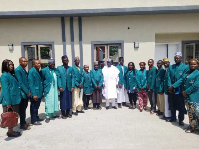 A group photograph of Volunteers deployed to the Benin Republic 🇧🇯 and Rwanda 🇷🇼 respectively during the Debriefing of the Volunteers by the Director General of the Nigerian Technical Aid Corps, Ministry of Foreign Affairs Rt. Hon. Yusuf Buba Yakub and Directors of NTAC.