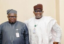 L-R : The Surveyor General of the Federation (SGOF) Abduganiyu Adeyemi Adebomehin next to him is Permanent Secretary of the Federal Ministry of Housing and Urban Development Dr Shuaib Belgore at the briefing