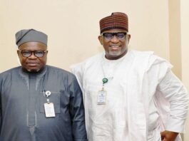 L-R : The Surveyor General of the Federation (SGOF) Abduganiyu Adeyemi Adebomehin next to him is Permanent Secretary of the Federal Ministry of Housing and Urban Development Dr Shuaib Belgore at the briefing