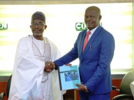The outgoing Registrar of COREN, Engr. Prof. Adisa Bello, FNSE, FAEng (left), hands over to the incoming Registrar, Engr. Prof. Okorie Austine Uchegbusi Uche, FNSE, FNICE, KJW (right) with a handshake during the official transition ceremony held on March 14, 2025, at the COREN headquarters.