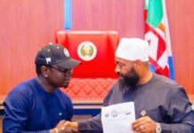 The Honourable Minister, Federal Ministry of Youth Development, Comrade Ayodele Olawande and the Governor of Niger State, Mohammed Umar Bago during the signing of MoU to empower 100,000 youths through a National Youth Agricultural Scheme which was held at the Council Chamber of the Government House in Minna.