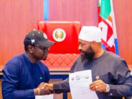 The Honourable Minister, Federal Ministry of Youth Development, Comrade Ayodele Olawande and the Governor of Niger State, Mohammed Umar Bago during the signing of MoU to empower 100,000 youths through a National Youth Agricultural Scheme which was held at the Council Chamber of the Government House in Minna.