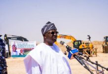 The Honourable Minister of Water Resources and Sanitation, Engr. Prof. Joseph Terlumun Utsev, FNSE, FNICE, FNIWE, delivering his address during the flag-off ceremony