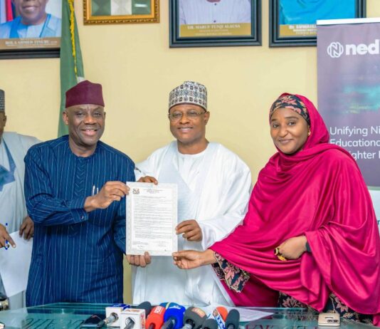 Governor Sani Present Certificate Of Occupancy To Hon. Minister Of Education