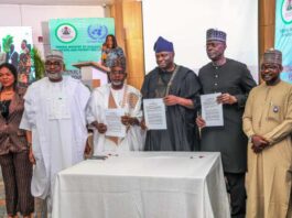 L-R, Honourable Minister of State, Federal Ministry of Regional Development, Uba Amadu Magari, Honourable Minister of State Federal Ministry of Humanitarian Affairs and Poverty Reduction Dr Yusuf Tanko Sununu, Honourable Minister of Humanitarian Affairs and Poverty Reduction Professor Nentawe Goshwe Yilwatda, United Nations, Resident Coordinator in Nigeria Mohamed Malik Fall, and members of the Communique drafting committee showcasing the signed copy of the Communique of the two-day National Humanitarian Roudtable held on Wednesday 26th March,2025 in Abuja