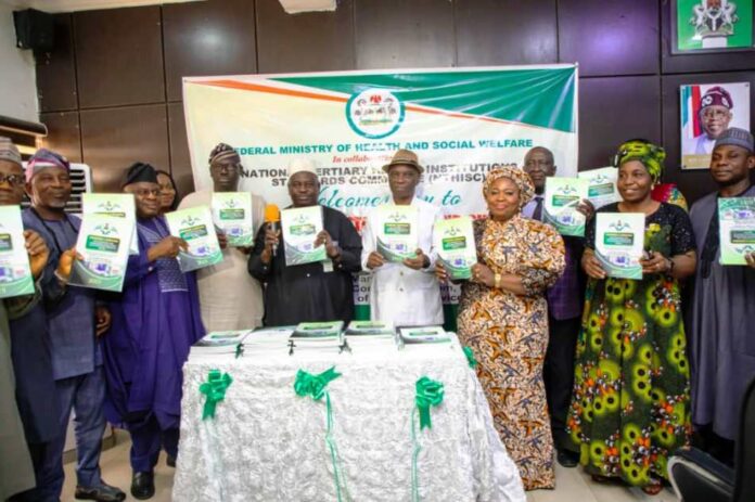 Launching of Document on Standards & Guidelines for Establishing & Coordinating Organ/Tissue Transplantation Services in Nigeria: Dr. Salaudeen Jimoh mni, Director Hospital Services Department of the Ministry representing Hon Minister of State for Health; on his left: Prof. Dr. (Med.) Phillip Abiodun; next, Tetshoma Dafeta, Director Human Resource Management Department of the Ministry, representing the Permanent Secretary; supported by other members of the Committee.