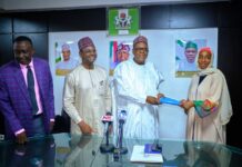 Signing of MoU between the National Hospital Abuja and Four Private Institutions: the Coordinating Minister for Health & Social Welfare Prof. Muhammad Ali Pate holding the MoU booklet with the CEO, Concerned Medix Foundation (a Diaspora based Nigerian Organization) 2ndLeft: Prof. Raji Mahmud Chief Medical Director National Hospital Abuja: Left: Barrister Tobi Omosa Director Legal Service Department of the Ministry.