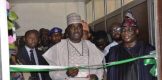 L-R. The Minister of State for Agriculture and Food Security, Sen.Dr Aliyu Sabi Abdullahi and Director, Department of Agricultural Extension Services, Dr Deola Tayo Lordbanjou during the unveiling of the NEEP back-end office in Abuja