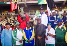 Chairman, National Sports Commission, Mallam Shehu Dikko flanked to his left by Director, Grassroots Sport, Mrs. Amaka Ashiofu, Ahmed Kawu SA to the Chairman, to his Right, Representative of Nigeria Police Force, Brig. Gen. Ektuk of Nigeria Army, Mrs. Kehinde Ajayi, Director Press and Public Relations (NSC) and some medalists during the closing ceremony of One Service One Medal Gamees at the MKO Abiola National Stadium, Abuja on Tuesday 29th April, 2025.