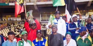 Chairman, National Sports Commission, Mallam Shehu Dikko flanked to his left by Director, Grassroots Sport, Mrs. Amaka Ashiofu, Ahmed Kawu SA to the Chairman, to his Right, Representative of Nigeria Police Force, Brig. Gen. Ektuk of Nigeria Army, Mrs. Kehinde Ajayi, Director Press and Public Relations (NSC) and some medalists during the closing ceremony of One Service One Medal Gamees at the MKO Abiola National Stadium, Abuja on Tuesday 29th April, 2025.