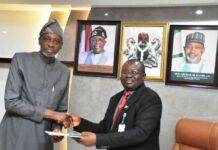 L-R, the Director General, NIPSS, Prof. Ayo Omotayo received the National Agricultural Policy Document from the Permanent Secretary, FMAFS, Dr Marcus Olaniyi Ogunbiyi, during the courtesy visit.