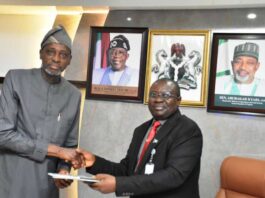 L-R, the Director General, NIPSS, Prof. Ayo Omotayo received the National Agricultural Policy Document from the Permanent Secretary, FMAFS, Dr Marcus Olaniyi Ogunbiyi, during the courtesy visit.