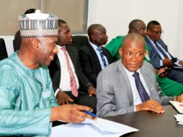 The Hon.Min. of State for Industry, FMITI, Sen. John Owan Enoh(right ) and the Perm. Sec. FMITI, Amb. Nura Abba Rimi, (left) during the High- level Roundtable Session with Stakeholders in the Presidential Priority Sectors , in Abuja on Thursday.