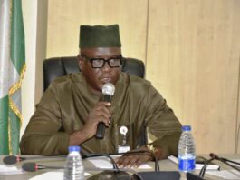 Representative of the Permanent Secretary and the Director of Midstream/DownStream Department, Mr. Mohammed Mohammed Abubakar delivering the inauguration remarks.