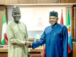 R-L: The Special Adviser to the President on Senate Matters, Senator Basheer Lado in a handshake with the Executive Vice-Chairman (EVC) and Chief Executive Officer of the Nigerian Communications Commission, Dr. Aminu Maida at his office.