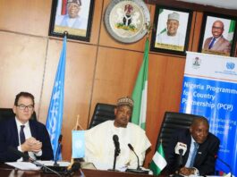 The Hon. Min. of State (Industry) FMITI, Sen. John Owan Enoh (right), Hon. Min. of Budget and Economic Planning, Sen. Abubakar Atiku Bagudu (middle), the DG, United Nations Industrial Development Organization (UNIDO), Mr Gred Muller (left), during the signing of the Nigeria Programme for Country Partnership (PCP) in Abuja.