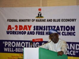 The Permanent Secretary, Federal Ministry of Marine and Blue Economy, Olufemi Oloruntola , addressing participants at the Day-1 of the sensitization workshop held at Federal Ministry of Finance auditorium.