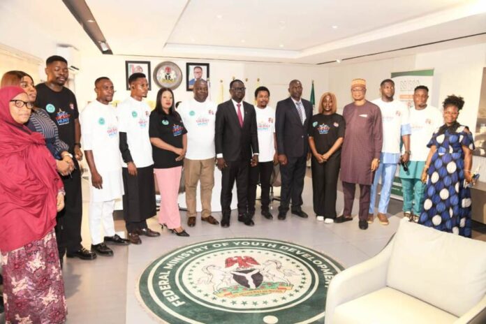 Teenage Talent Reality Show he Honourable Minister, Federal Ministry of Youth Development, Comrade Ayodele Olawande, the Management team of the Ministry and the team of the Teenage Talent Hunt project in a group photograph.