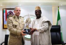 LtoR, Permanent Secretary, Federal Ministry of Art, Culture, Tourism and Creative Economy Dr Mukhtar Muhammad, Presenting a Gift to General Baouche Amrouche of Algeria War College