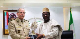 LtoR, Permanent Secretary, Federal Ministry of Art, Culture, Tourism and Creative Economy Dr Mukhtar Muhammad, Presenting a Gift to General Baouche Amrouche of Algeria War College