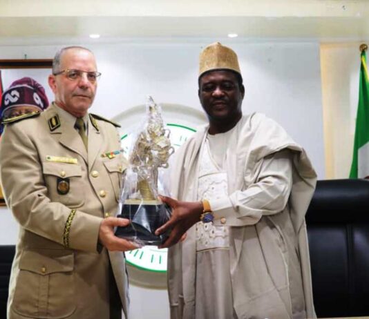 LtoR, Permanent Secretary, Federal Ministry of Art, Culture, Tourism and Creative Economy Dr Mukhtar Muhammad, Presenting a Gift to General Baouche Amrouche of Algeria War College
