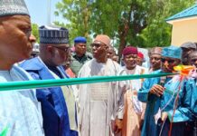 The Minister of State, Ministry Regional Development, Hon. Uba Maigari Ahamadu with the Borno State Governor, Prof. Eng Babagana Umara Zulum, MD NEDC, Muhammad G. Alkali and other dignitaries, during the commissioning and handling over of major projects executed by the North East Development Commission (NEDC) to Borno State Government.