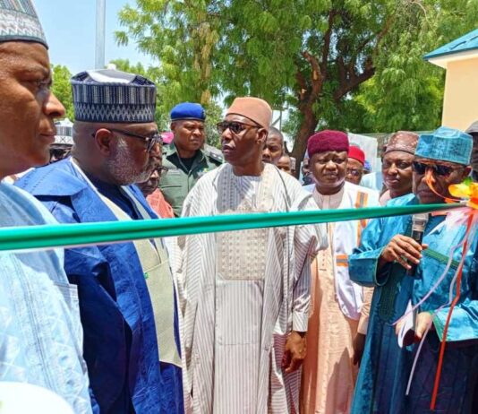 The Minister of State, Ministry Regional Development, Hon. Uba Maigari Ahamadu with the Borno State Governor, Prof. Eng Babagana Umara Zulum, MD NEDC, Muhammad G. Alkali and other dignitaries, during the commissioning and handling over of major projects executed by the North East Development Commission (NEDC) to Borno State Government.
