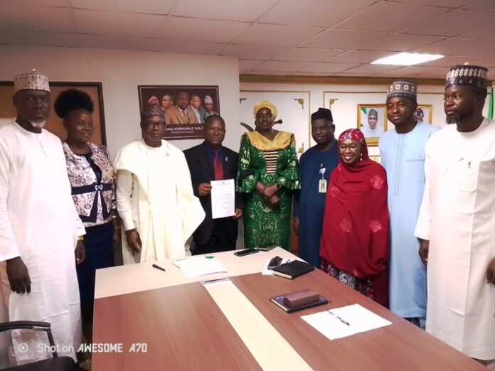 Dental Therapists' Registration Board of Nigeria From 2nd Left: Mrs. Anisere Dele; Dr. Iziaq Adekunle Salako Honourable Minister of State for Health & Social Welfare; Dr. Anisere Dele, Registrar Dental Therapists' Registration Board of Nigeria DThRBN; Daju Kachollom mni, Permanent Secretary; Dr. Salaudeen Jimoh mni, Director Hospital Services Department