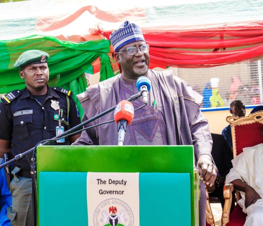 The Deputy Governor of Yobe State, Hon. Idi Barde Gubana, delivering his remarks on behalf of the Governor at the commissioning ceremony.