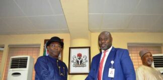 L-R: Chairman, Fiscal Efficiency and Budget Committee (RMAFC), Amb. Desmond Akawor and Acting Executive Chairman, FCT-IRS, Mr. Micheal Ango at the RMAFC Headquarters, Abuja.