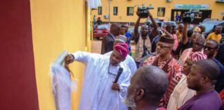 Dr. Iziaq Adekunle Salako HMS-FMoH&SW unveiling the plaque to commission the 68-Room Consultants Building, one of the five projects executed by the FMC Abeokuta.