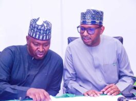 The Chairman, National Sports Commission, Mallam Shehu Dikko in a tete-a-tete with the Director, Finance and account NSC during the inauguration ceremony of King's Batton Ceremony committee in Nigeria at the media centre of MKO Abiola Stadium, Abuja.