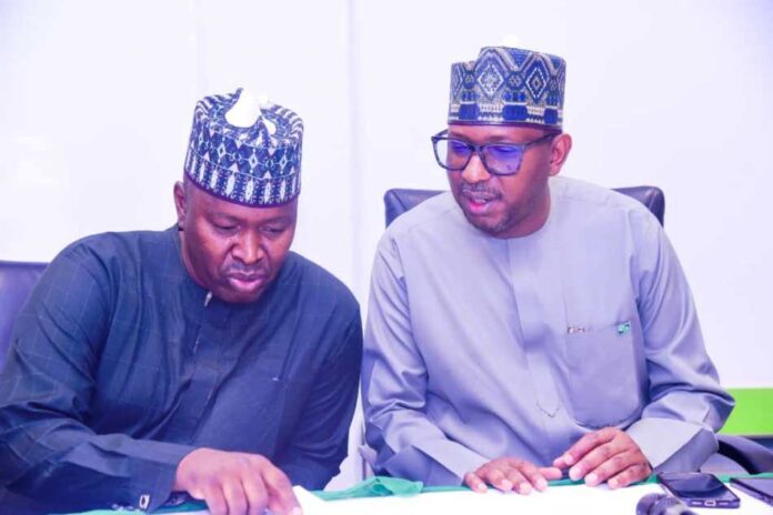 FG Inaugurates 22-Member Planning Committee The Chairman, National Sports Commission, Mallam Shehu Dikko in a tete-a-tete with the Director, Finance and account NSC during the inauguration ceremony of King's Batton Ceremony committee in Nigeria at the media centre of MKO Abiola Stadium, Abuja.