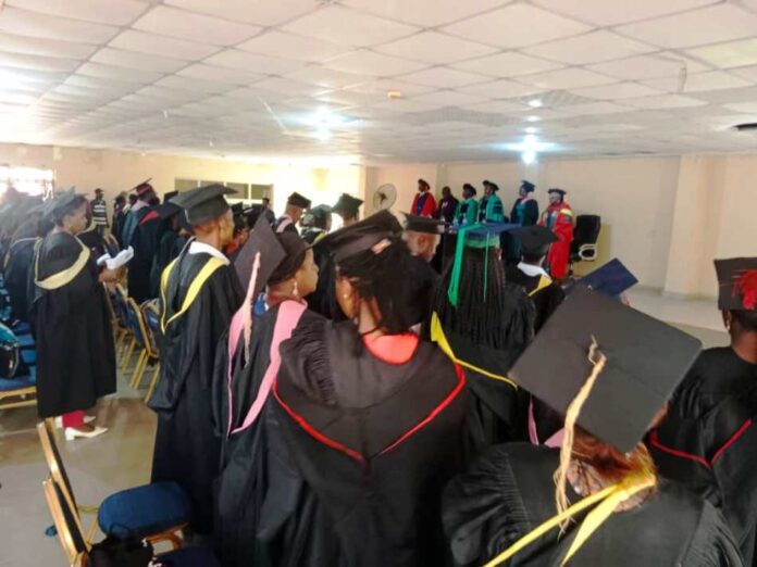Graduating Teachers Officials and a Cross Section of the Inductees During the Ceremony T the Conference Hall Federal Secretariat Complex Asaba Delta State.